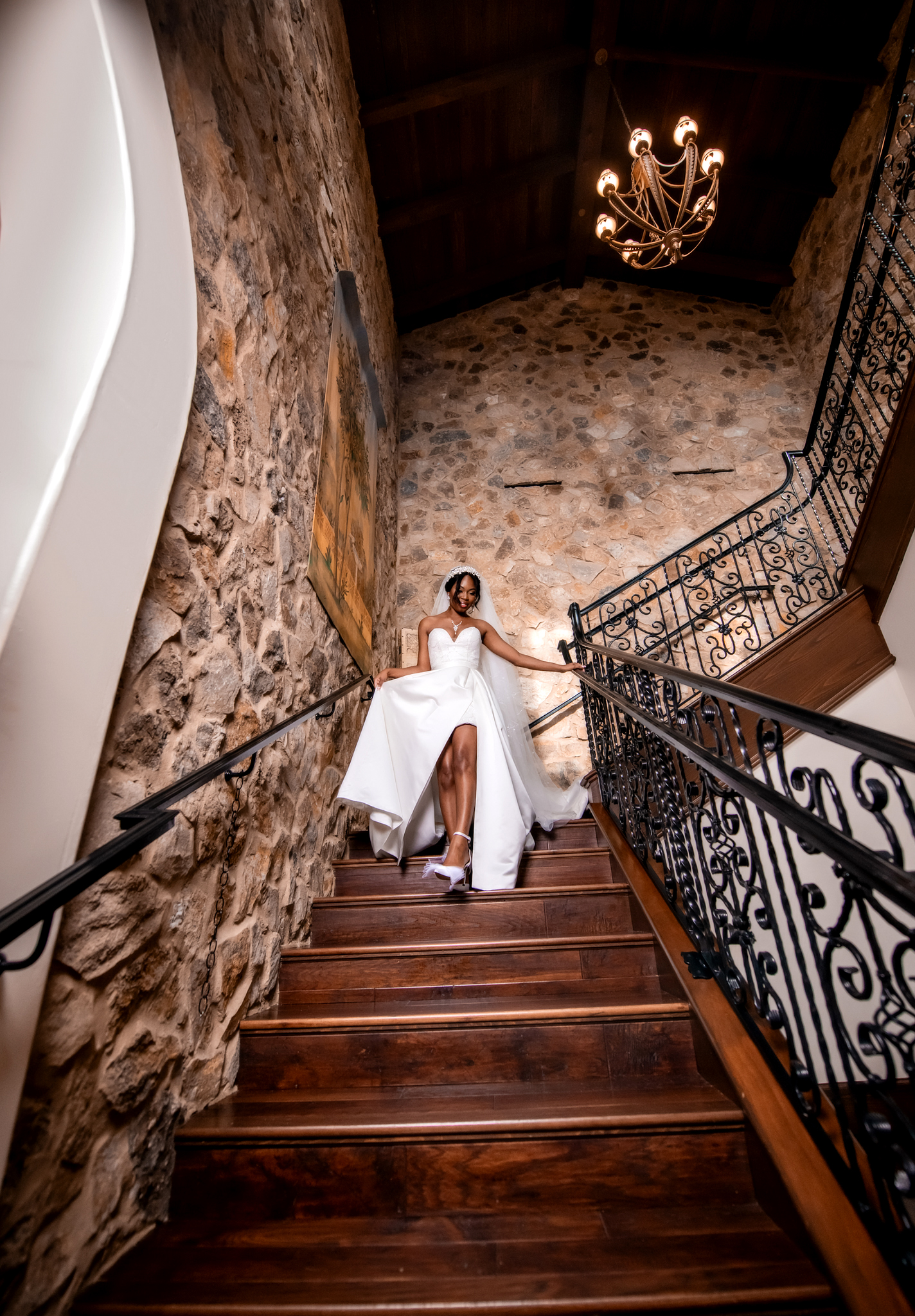 bride walking down stairs at Orlando wedding venue