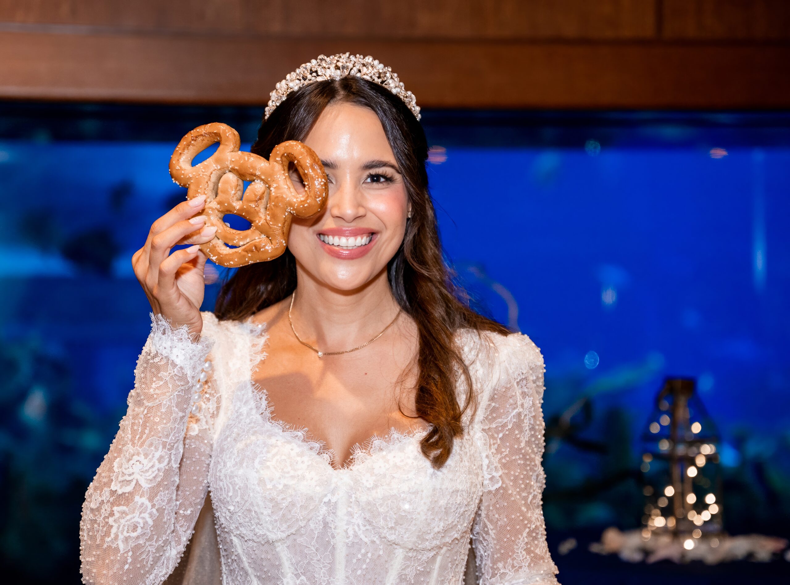 Mickey pretzel held by the bride