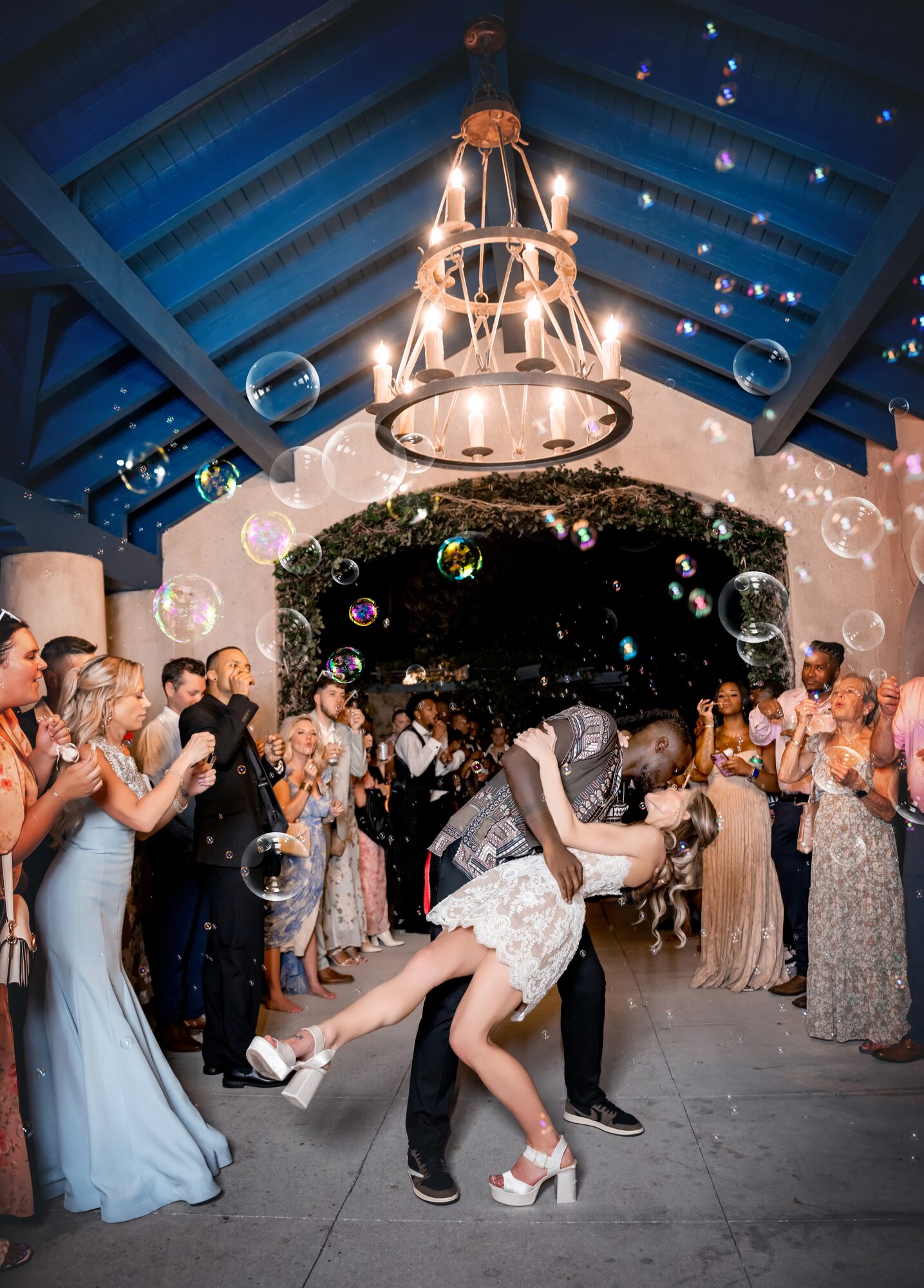 Bride and groom's first dance with cold sparklers on the dance floor
